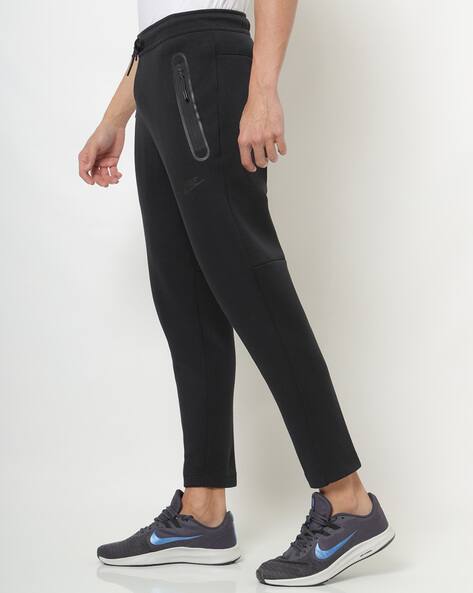 Buy Black Track Pants for Men by NIKE 