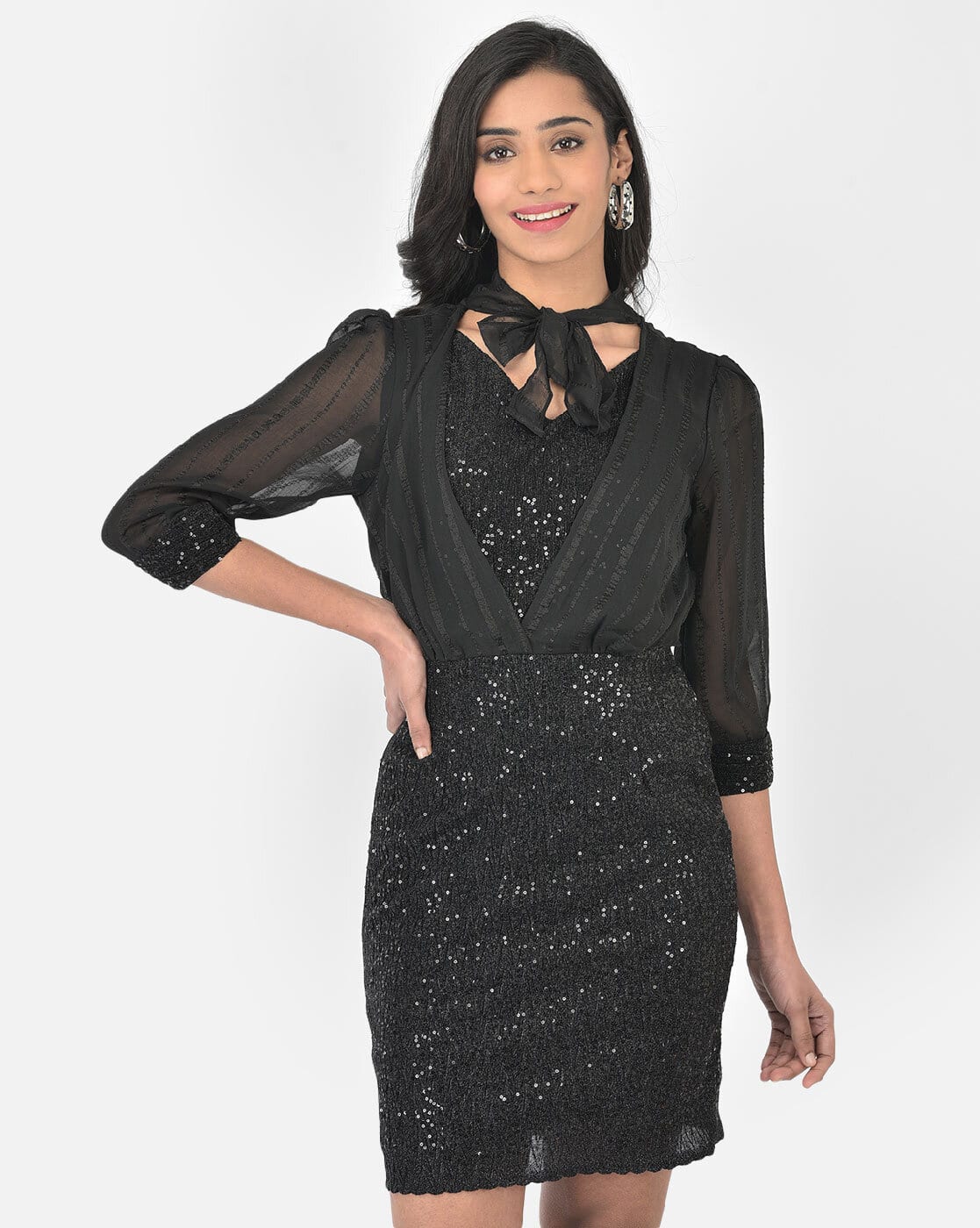 black sequin fit and flare dress