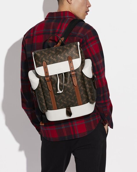 hitch backpack with horse and carriage print