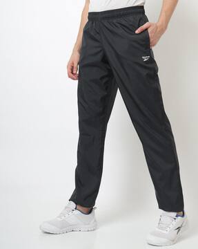 Buy Black Track Pants for Men by Reebok 