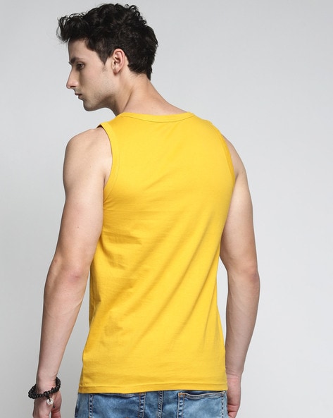 yellow sleeveless vest