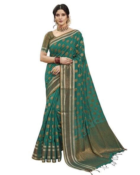 TIA FASHION - This tastefully designed saree with its rich peacock green  color and gold border is the perfect look for every occasion. | Facebook