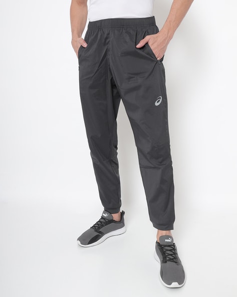 Asics track clearance pants india