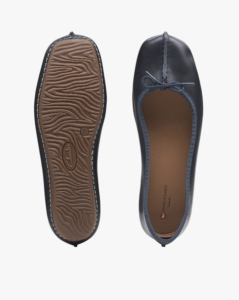 Clarks navy flat on sale shoes