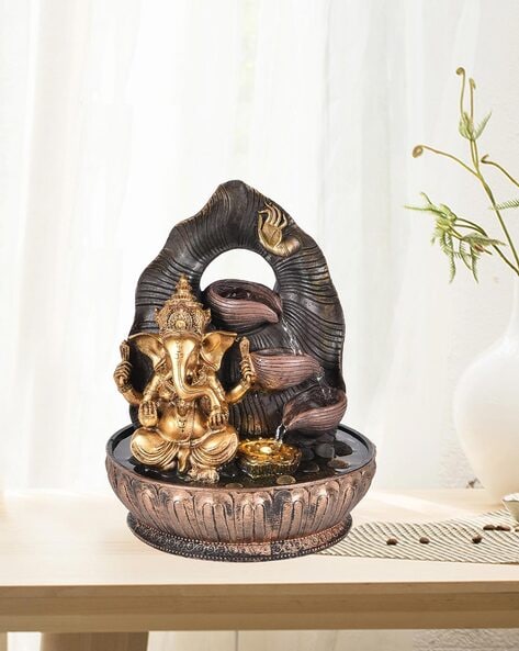 Buy Gold Showpieces & Figurines for Home & Kitchen by