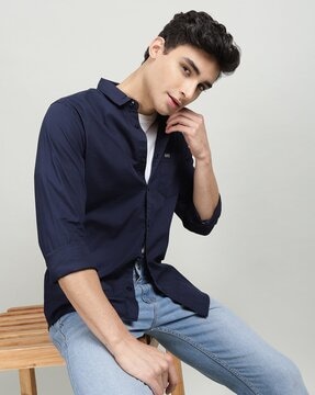 Dark blue shirt and black clearance jeans