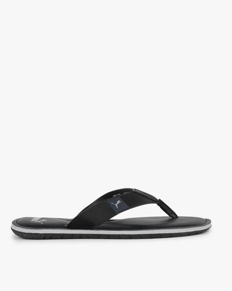 puma black thong flip flops