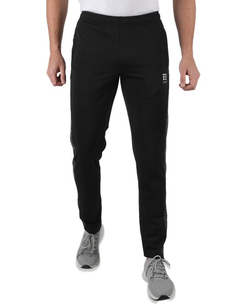 UNDER ARMOUR Solid Men Black Track Pants - Buy UNDER ARMOUR Solid Men Black Track  Pants Online at Best Prices in India