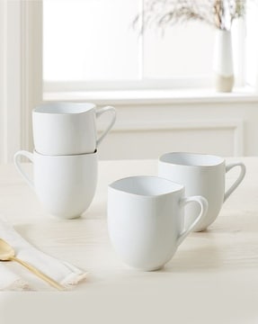 https://assets.ajio.com/medias/sys_master/root/20220317/UnXp/62324599f997dd03e2199e0c/west-elm-white-mugs-%26-mason-jars-set-of-4-organic-rimmed-porcelain-mug.jpg