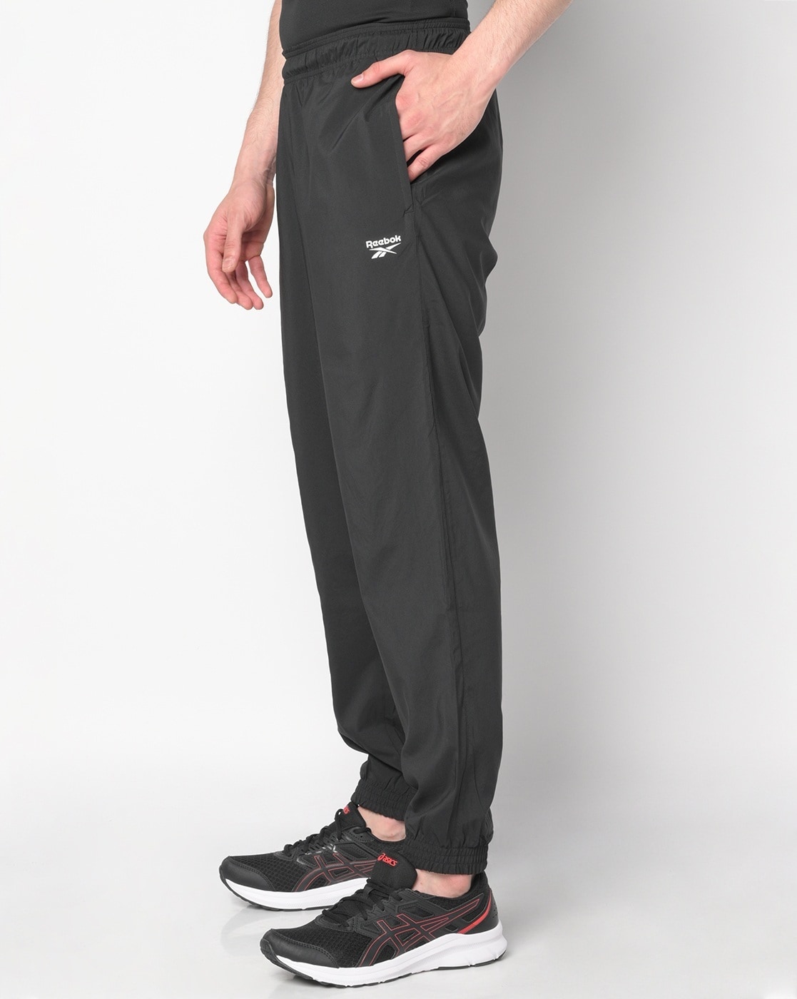 Buy Black Track Pants for Men by Reebok Online | Ajio.com