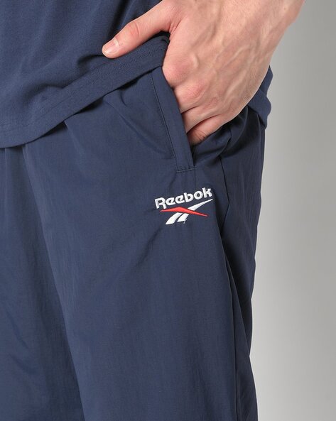 Pantalon reebok store homme deepblue