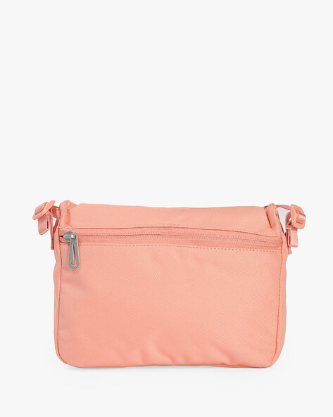 Nike pink sling online bag