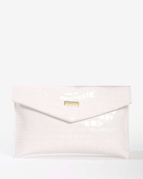Saint Laurent Sade Puffer Envelope Clutch Bag - Farfetch | Clutch bag, Envelope  clutch bag, White clutch purse