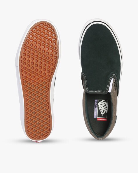 vans slip ons brown sole