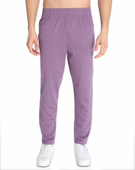 light purple adidas track pants