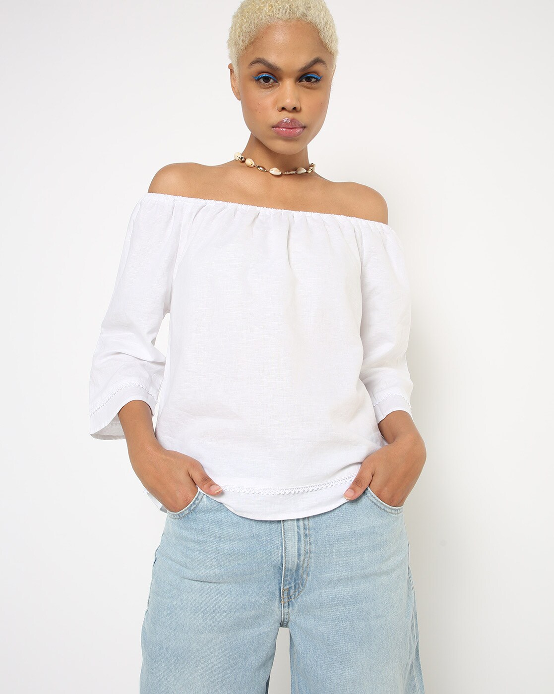 white button down off the shoulder shirt