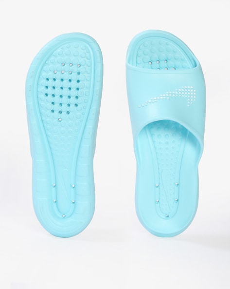 Light blue nike slides hotsell