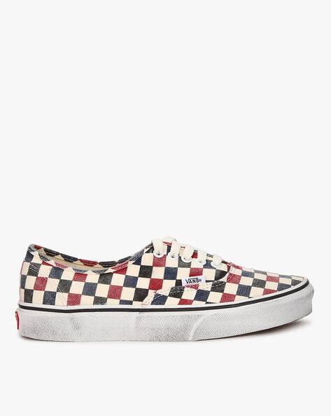 black vans with red and white checkered