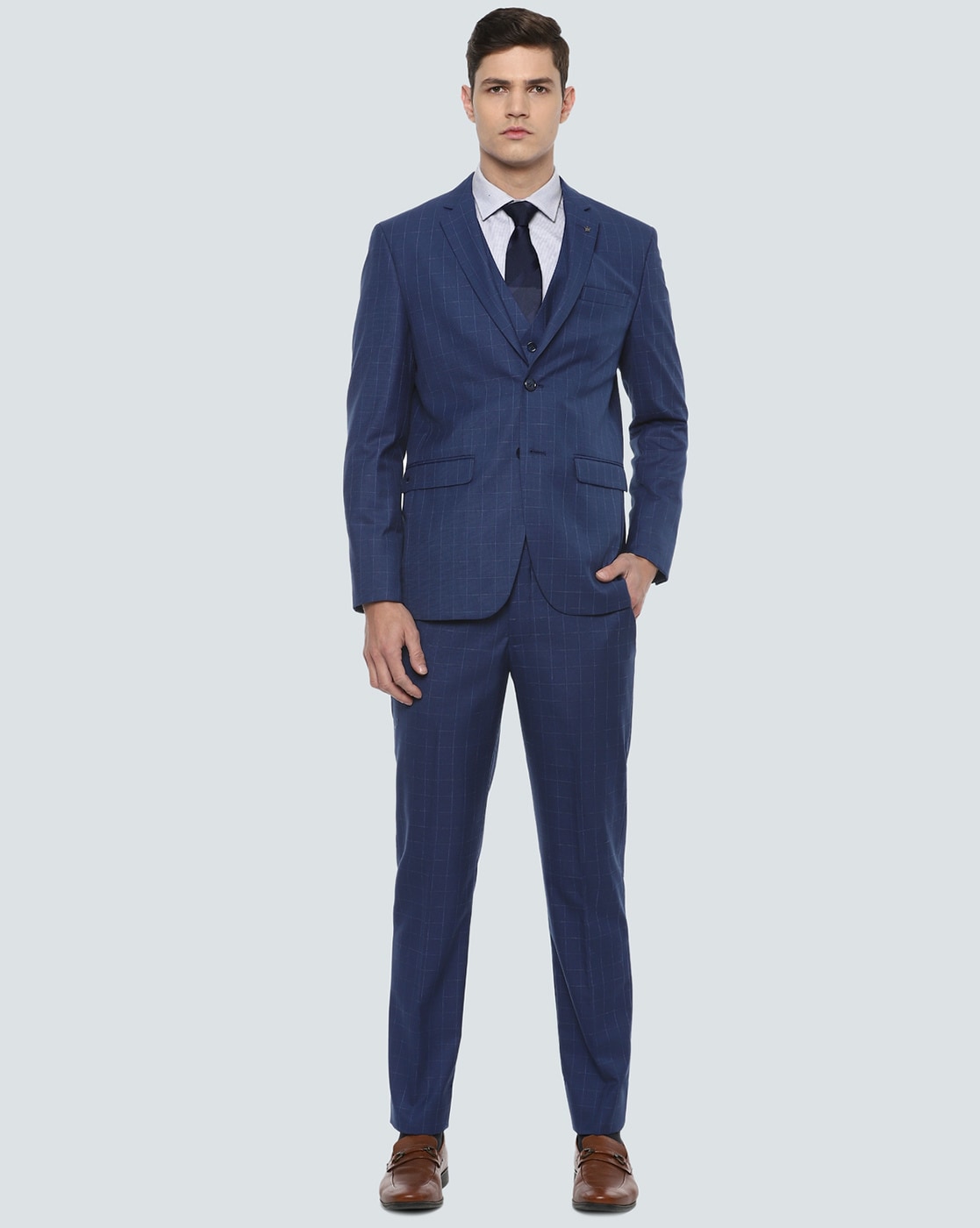 Louis Philippe - Bold yet elegant, this blue suit from our
