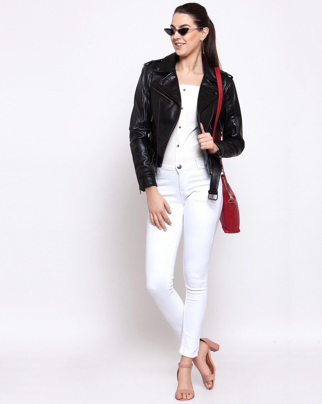 Full length portrait of stylish young girl wear on leather jacket and  ripped jeans. Street fashion model style. Stock Photo | Adobe Stock