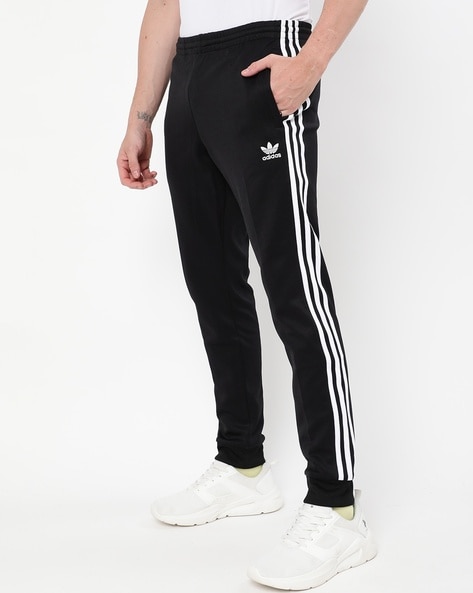 adidas Essentials Single Jersey Tapered Badge of Sport Pants  Blue  adidas  India
