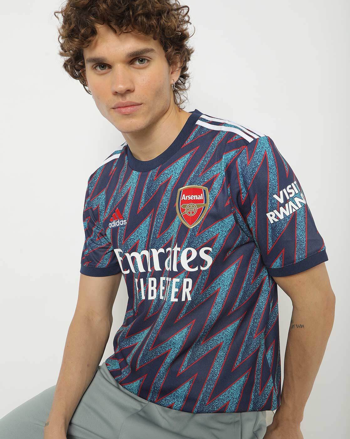 Arsenal blue hot sale shirt