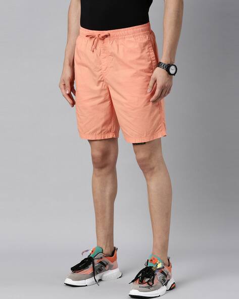 Orange Shorts for Men by BREAKBOUNCE 
