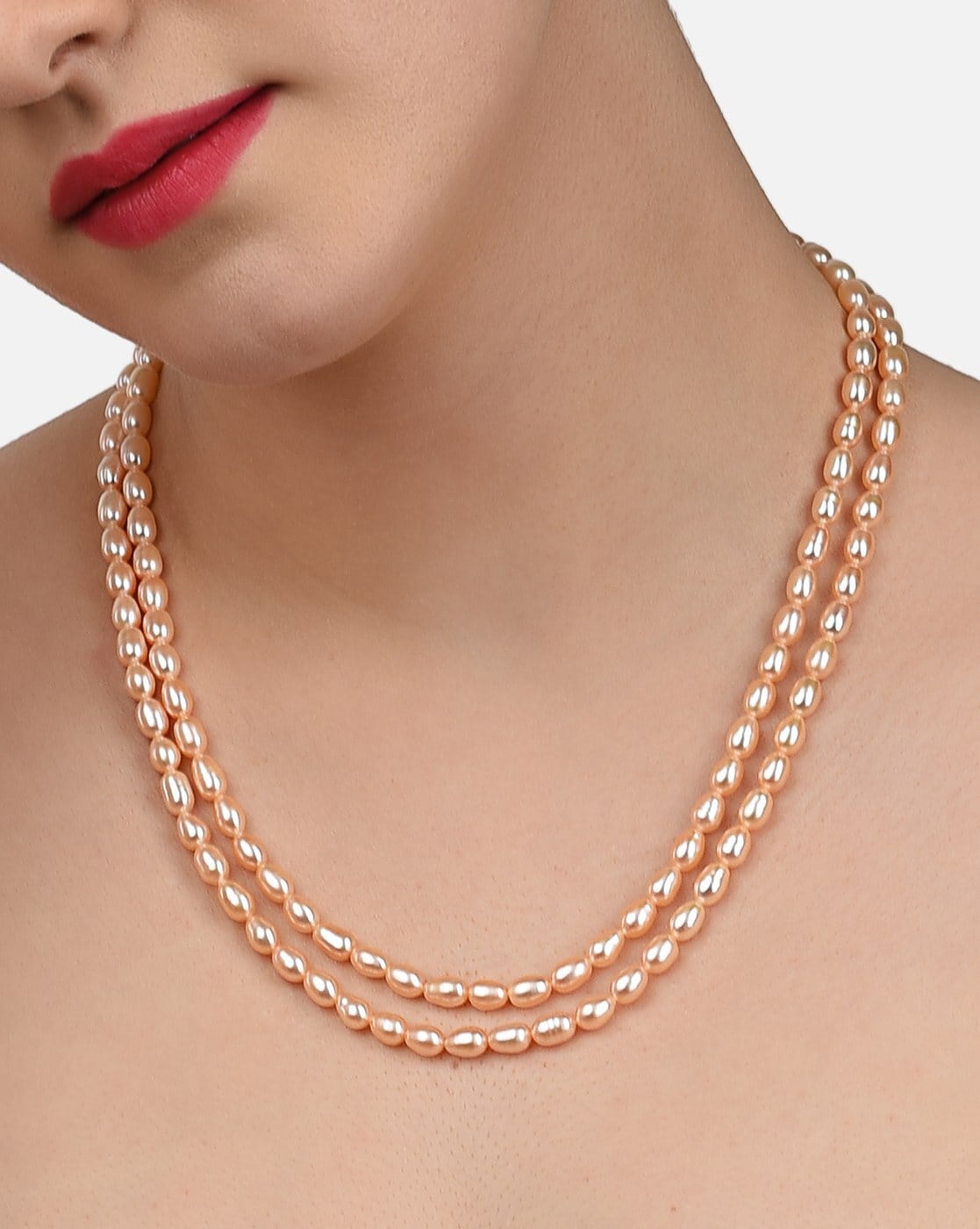 Peach color pearl deals necklace