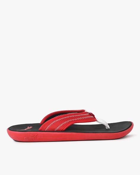 Puma red cheap and black slippers