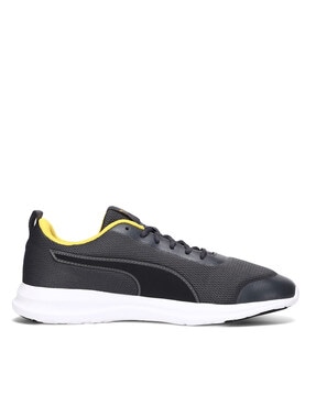 black and white pumas women's