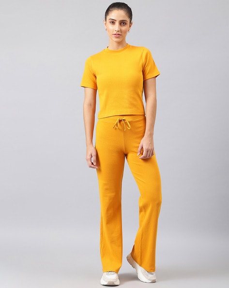Buy Aks Yellow Mid Rise Trousers for Women Online @ Tata CLiQ