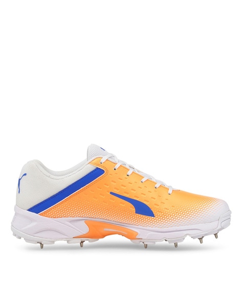 Puma gold outlet cricket spikes