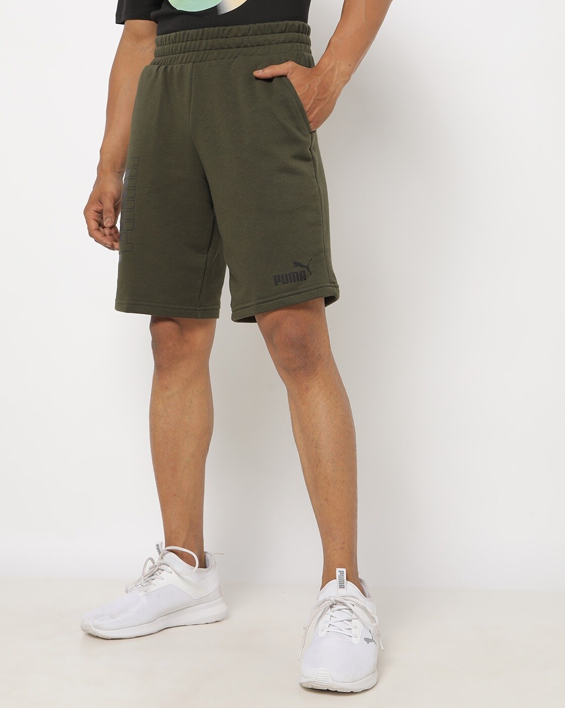 olive green puma shorts