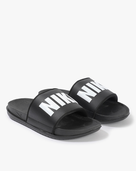 nike offcourt sliders in black with fur