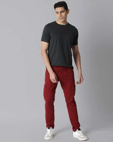 How can men wear red pants without looking like clowns? What colors should  be worn along with red pants for an elegant look? - Quora