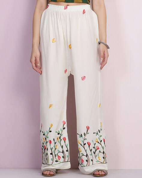 Buy White Trousers & Pants for Women by BUYNEWTREND Online