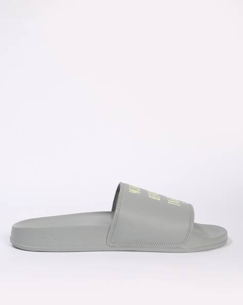 reebok printed vector slides