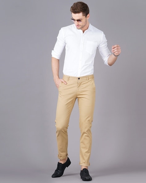 1200 White Shirt Khaki Pants Stock Photos Pictures  RoyaltyFree Images   iStock