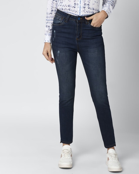 Lightly Washed Skinny Fit Jeans with Distressing