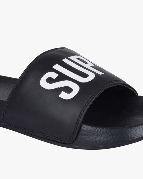 Supreme flip flops online black