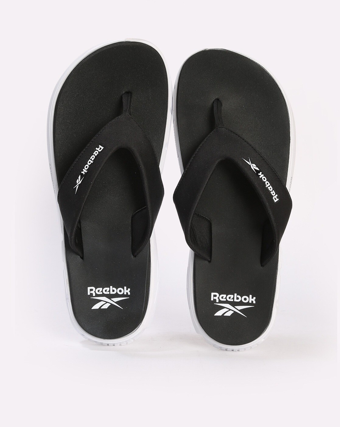 Buy Black Flip Flop u0026 Slippers for Men by Reebok Online | Ajio.com