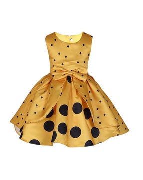 yellow dress with black dots