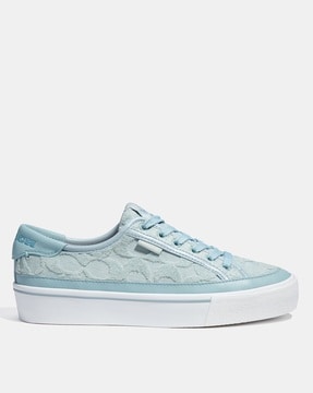 blue vans with white flowers