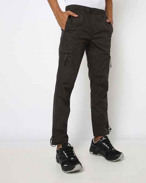 ASOS DESIGN tapered cargo trousers in black with toggles  ASOS