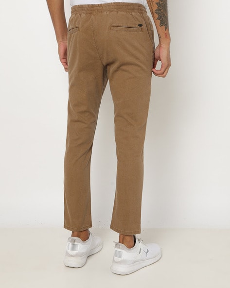 Buy John Players Men Khaki Solid Slim Flat Front Corduroy Trousers   Trousers for Men 1673553  Myntra