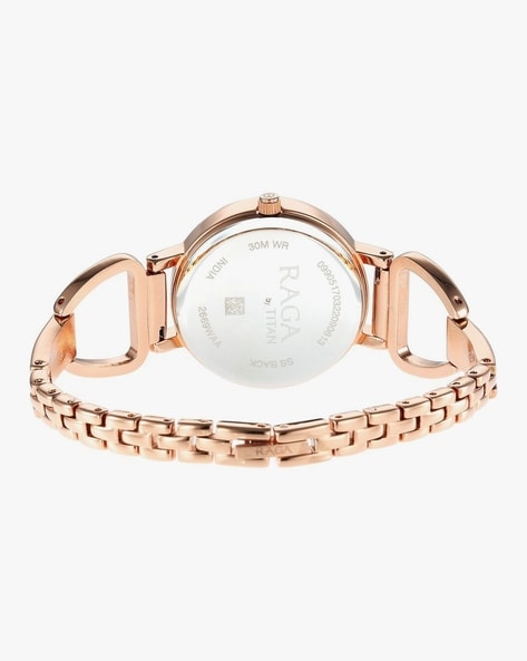 Titan raga espana rose gold hot sale