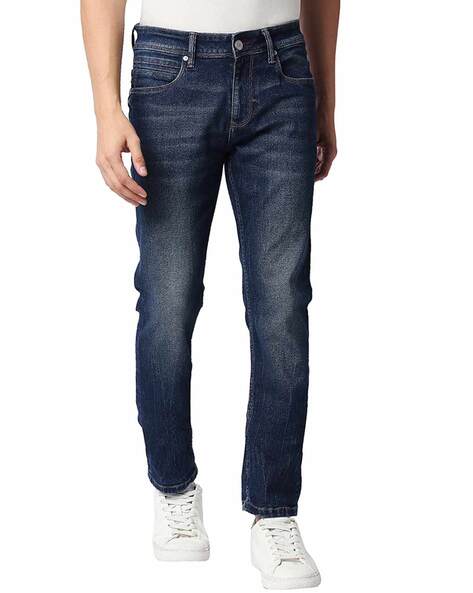 Wrangler Navy Blue Solid Mid Rise Slim Fit Jeans at Rs 2699/piece