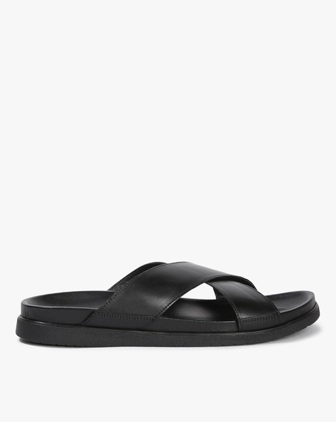 Black cross best sale over slippers