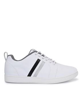 Buy WHITE Sports Shoes for Men by OFF 