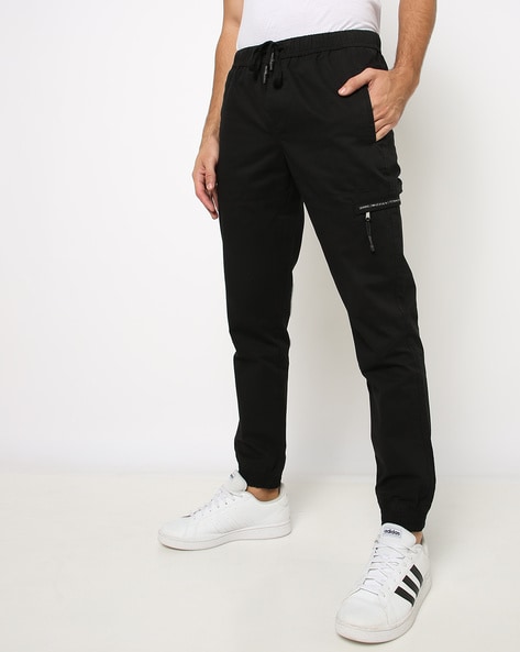 Buy Grey Trousers & Pants for Men by DNMX Online